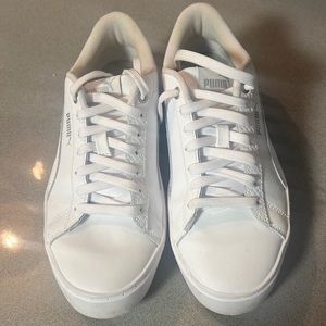 Size 8 1/2 white leather Puma tennis shoes
